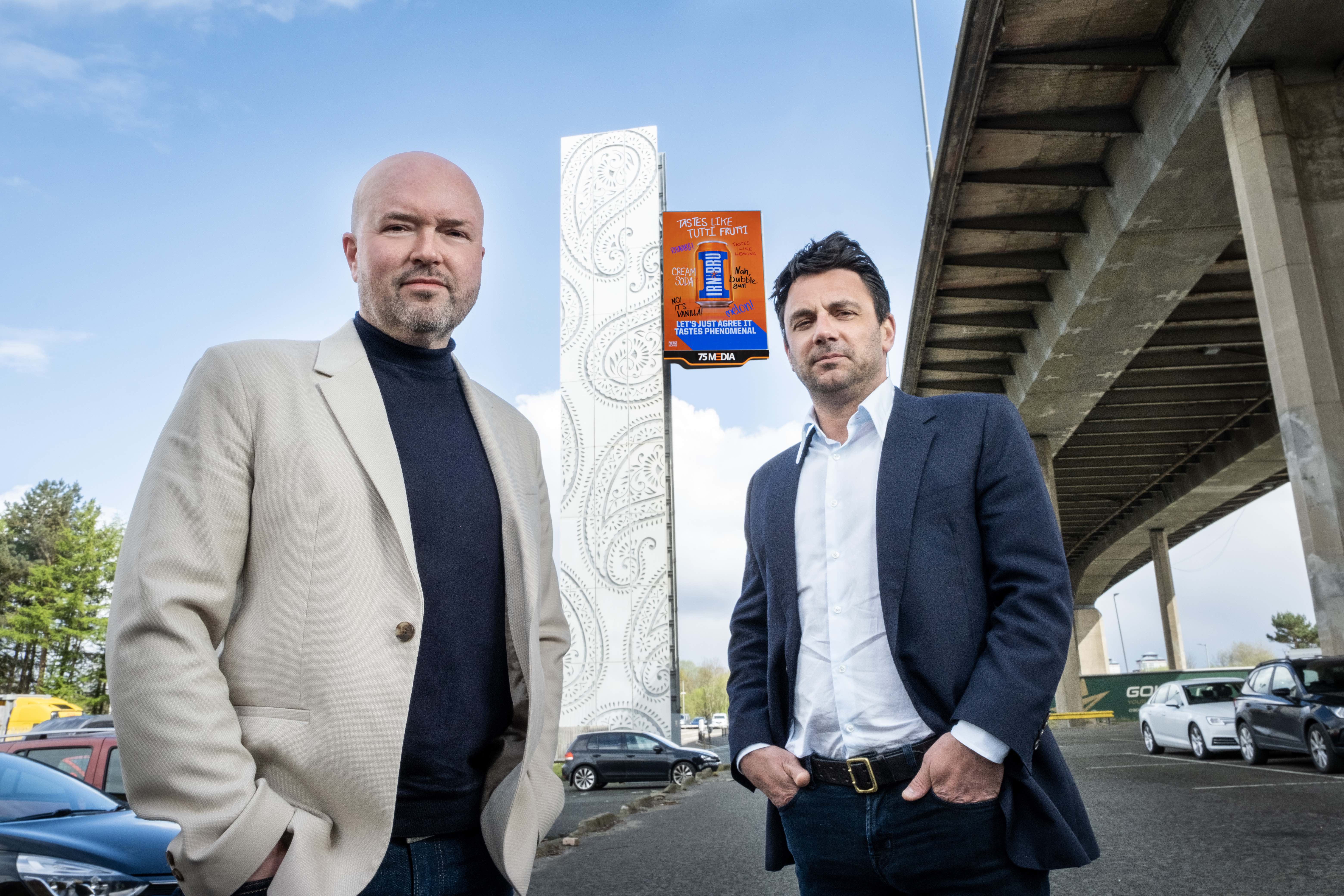  (L) Paul Inman, managing director of 75Media and Damian Cox, CEO of Wildstone, at 75Media's new landmark OOH site, the M8 Tower, Glasgow, Scotland