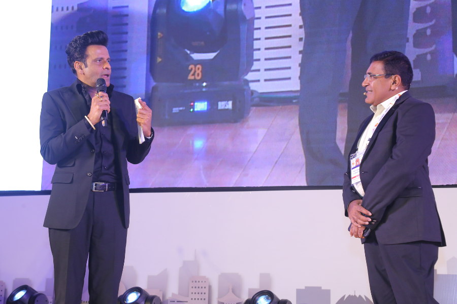 Manoj Bajpayee and Rajiv Raghunath on stage