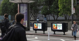 TV-size digital billboards straddle San Francisco streets