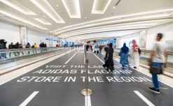 adidas unveils running track at DBX’s busiest arrival area