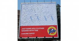 Tide says it all on the billboard with white magic
