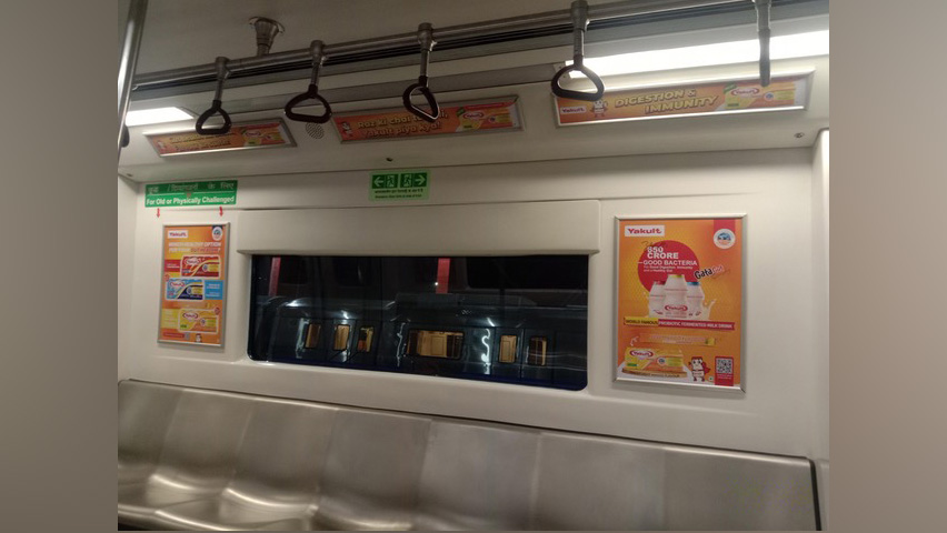 a subway with a window and signs